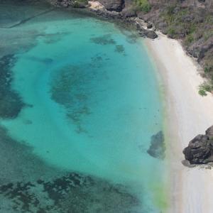 Waier Islet - Aerial view with sharks