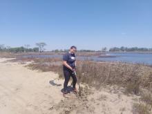 Masters Student deploying carbon decomposition bags