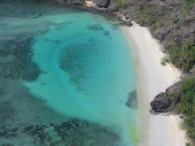 Waier Islet - Aerial view with sharks