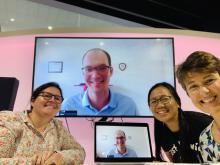 Members of the NESP TWQ Project 5.3 Team gather to discuss remote sensing of benthic light