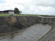 Upstream view of peak flood flows in the Mirriwinni area, at the Project 25 real-time monitoring point.